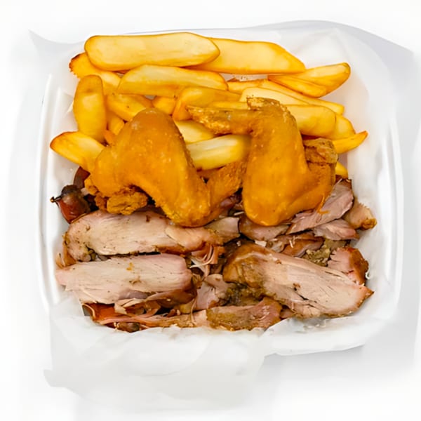 Sunny's Bar B Que chicken wings, sliced pork, and french fries in a white takeout container.